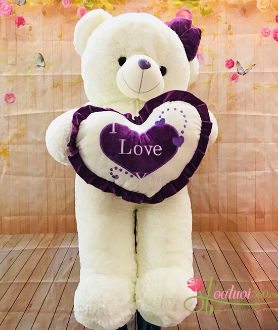 Gấu bông trắng ôm trái tim dễ thương